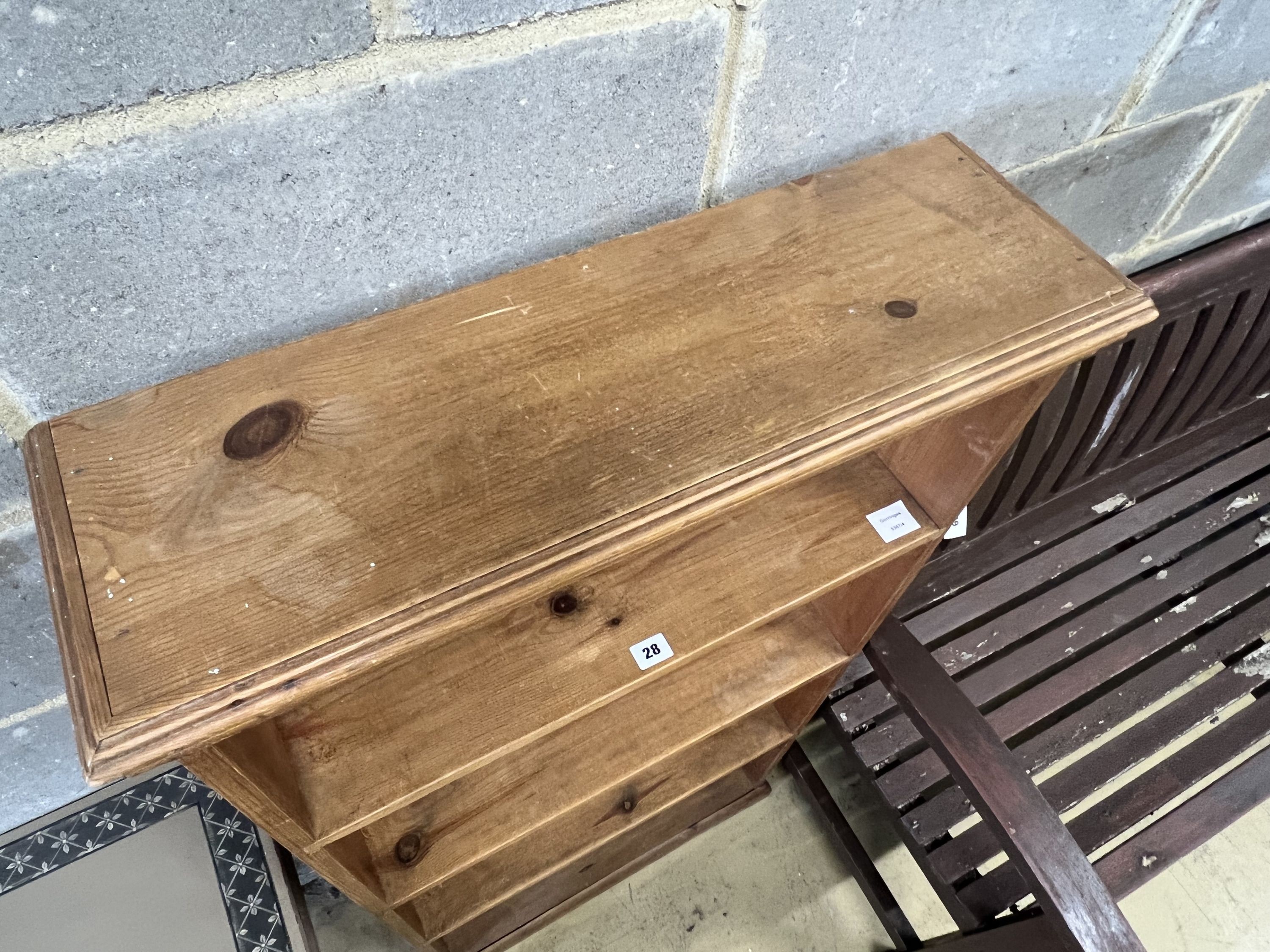 A pine open bookcase, width 66cm depth 21cm height 125cm